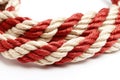 Twisted red and white nylon rope isolated on a white background. Generative AI