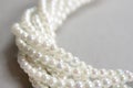 Twisted strands of white pearls Royalty Free Stock Photo