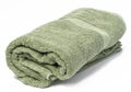 Twisted terry green towel on white background