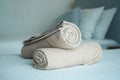 Twisted towels on the bed in the hotel room Royalty Free Stock Photo