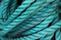 Twisted turquoise rope. Royalty Free Stock Photo