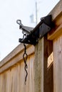 A twisted wire secures a gate as a deterrent