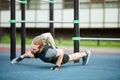 Twisting body while doing push-ups Royalty Free Stock Photo