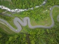 Twisting mountain road top down aerial view. Royalty Free Stock Photo