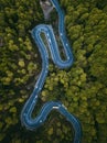 Twisty mountain road seen from above. Aerial view