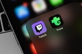 Twitch and Trovo mobile apps on screen