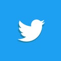 Twitter bird logo. Flat design over blue. Social media and networking.