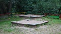 Two abandoned sandboxes in the corner of the playground Royalty Free Stock Photo