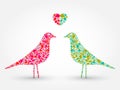 Two abstract birds with heart