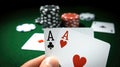 Two aces in hand. Winning combination in a poker game. Bet game in a casino. Copy space. Horizontal format. Royalty Free Stock Photo