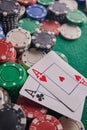 Two aces on the poker table and chips. casino, poker, a pair of aces Royalty Free Stock Photo