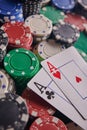 Two aces on the poker table and chips. casino, poker, a pair of aces Royalty Free Stock Photo
