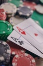 Two aces on the poker table and chips. casino, poker, a pair of aces Royalty Free Stock Photo