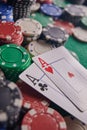 Two aces on the poker table and chips. casino, poker, a pair of aces Royalty Free Stock Photo