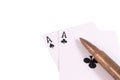 Two aces and rifle bullet right Royalty Free Stock Photo