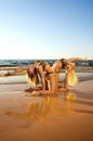 Two acrobatic girl on the beach Royalty Free Stock Photo