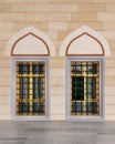 Two wrought iron arched windows with modern architectural design at the courtyard of Camlica Mosque, Istanbul, Turkey Royalty Free Stock Photo