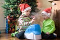 Two adorable boys playing with working humidifier, waiting for x-mas Royalty Free Stock Photo