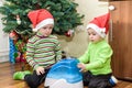 Two adorable boys playing with working humidifier, waiting for x-mas Royalty Free Stock Photo