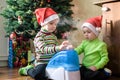 Two adorable boys playing with working humidifier, waiting for x-mas Royalty Free Stock Photo