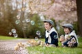 Two adorable preschool children, boy brothers, playing with litt Royalty Free Stock Photo