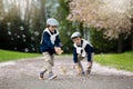 Two adorable preschool children, boy brothers, playing with litt Royalty Free Stock Photo