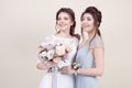 Two adorable women wearing in long fashionable dresses Royalty Free Stock Photo