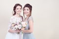 Two adorable women wearing in long fashionable dresses Royalty Free Stock Photo