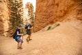 Two adult women hiking in Bryce Canyon National Park, Utah, USA while on vacation. Candid photo