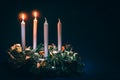 Two advent candles burning on black background Royalty Free Stock Photo