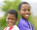 Two African American Boys in Soccer Uniforms Royalty Free Stock Photo