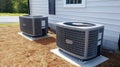 Two air conditioning units beside a building Royalty Free Stock Photo