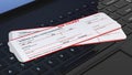 Two air tickets on black laptop Royalty Free Stock Photo