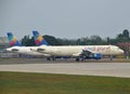 Two aircraft of Small Planet Airlines parking together at airport