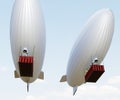 two airships or dirigible balloons are carrying containers