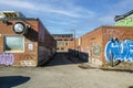 Two Alley-way crossing covered with graffiti in Montreal borough of Hochelaga Maisonneuve Royalty Free Stock Photo