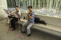 Amateur musicians in the garden in Shanghai, China.