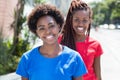 Two amazing african american girlfriends in the city