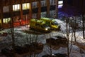 Two ambulance cars are waiting for a call. Ambulance in the night winter city. Calling a doctor at night. Health and medicine. Royalty Free Stock Photo