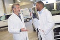 Two ambulance men chatting Royalty Free Stock Photo