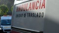Two ambulances in a row with the sign `ambulance transfer unit` in Spanish Royalty Free Stock Photo
