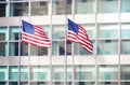 Two American Flags in front of an office building, New York Royalty Free Stock Photo