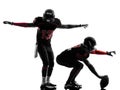 Two american football players on scrimmage silhouette