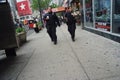 Two american police officers patrolling in new york, usa