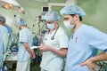 Two anaesthesiologist doctors at cardiac operation