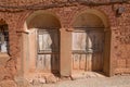 Two ancient doors of house built with clay and adobe bricks