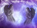 Two angels archangels with stars and divine mystic light Royalty Free Stock Photo