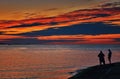 Two anglers on the Baltic Sea in the sunset Royalty Free Stock Photo