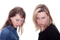 Two angry woman faces the viewer Royalty Free Stock Photo