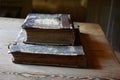 Very old books with leather cover on a table Royalty Free Stock Photo